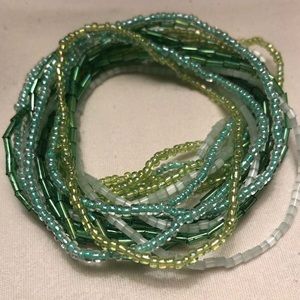 set of green and white beaded bracelets 🍏🧚‍♂️📗